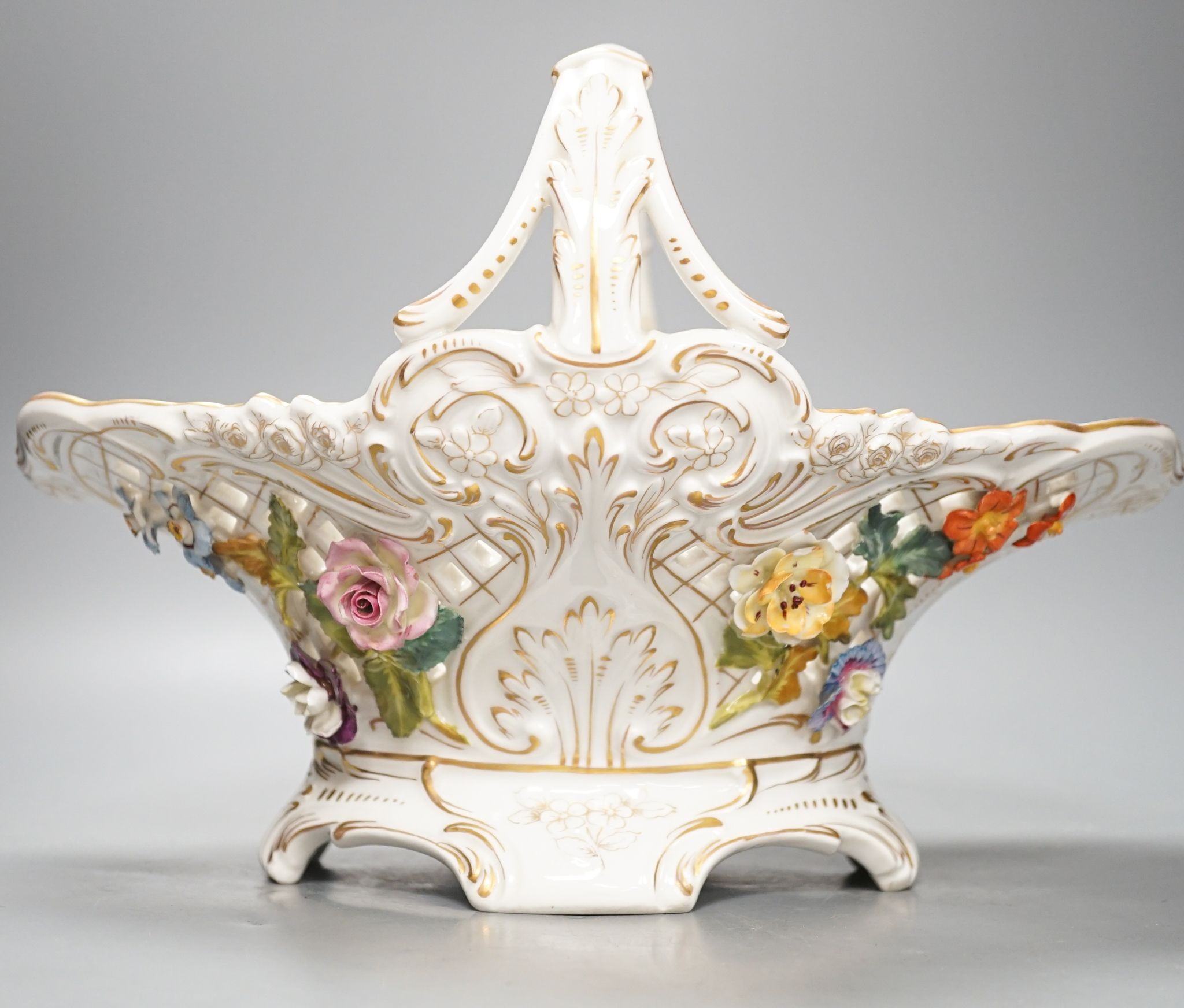 A Dresden porcelain floral encrusted basket 34cm